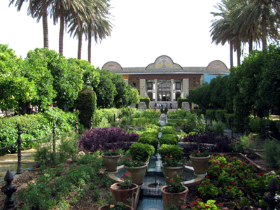Wooden pavilion and sour orange trees in Naranjistan Garden